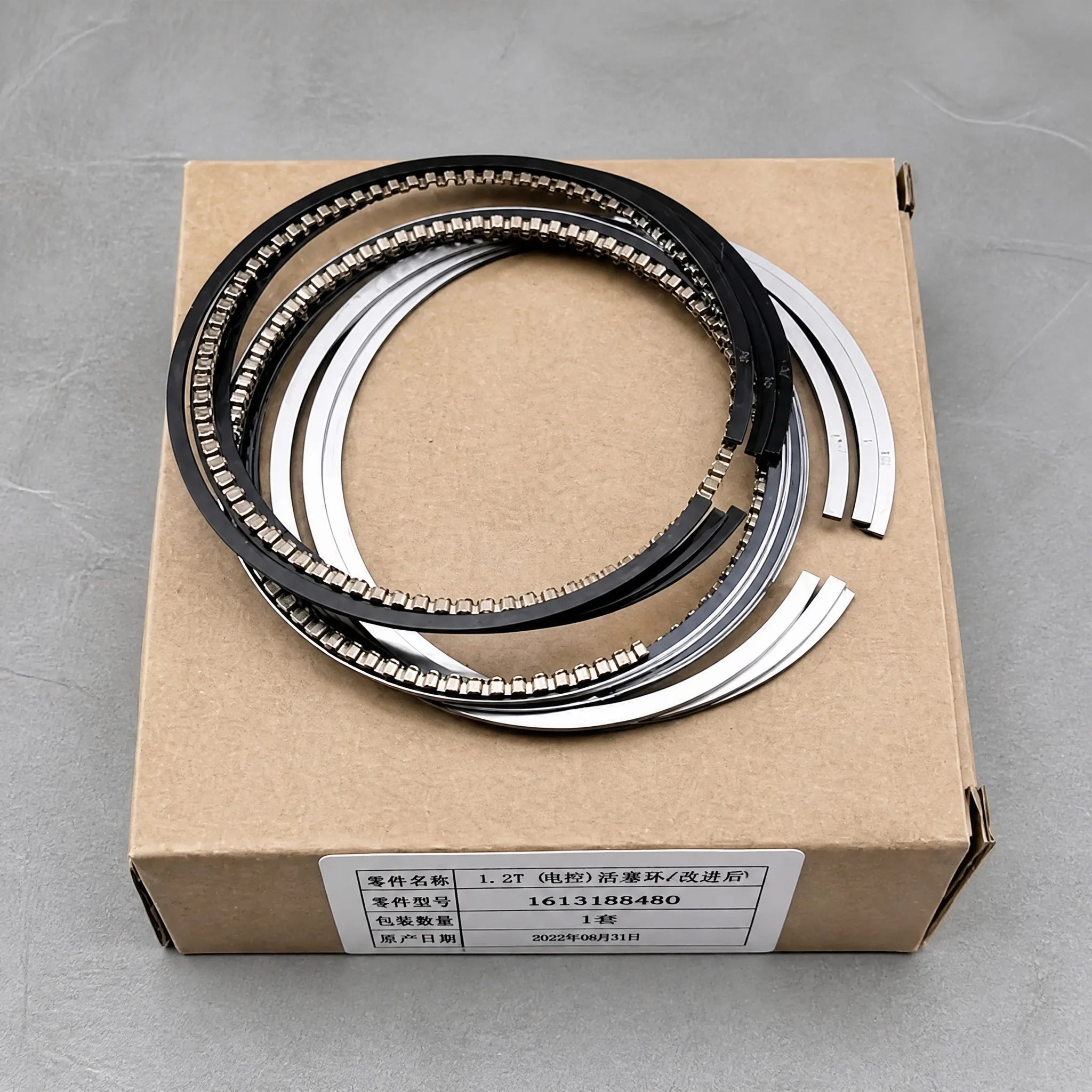 Automotive piston ring set flat-lay view